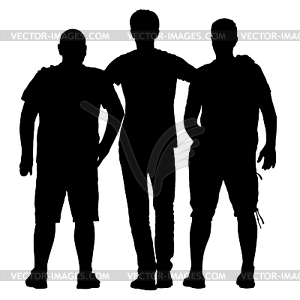 Black silhouette three men stand embracing.