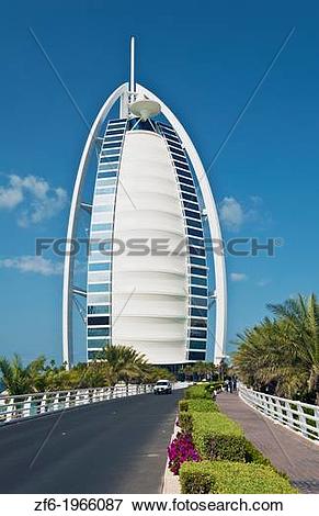 Picture of Only 7 star hotel called the Burj Al Arab with tourists.