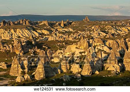 Stock Photography of Landscape with eroded tuff rock formations.