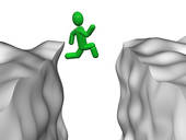 Clip Art of man leaping across chasm szo0022.