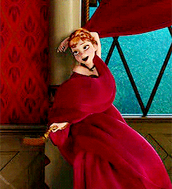 MRW im wrapped in a curtain twirling a tassel around and it.