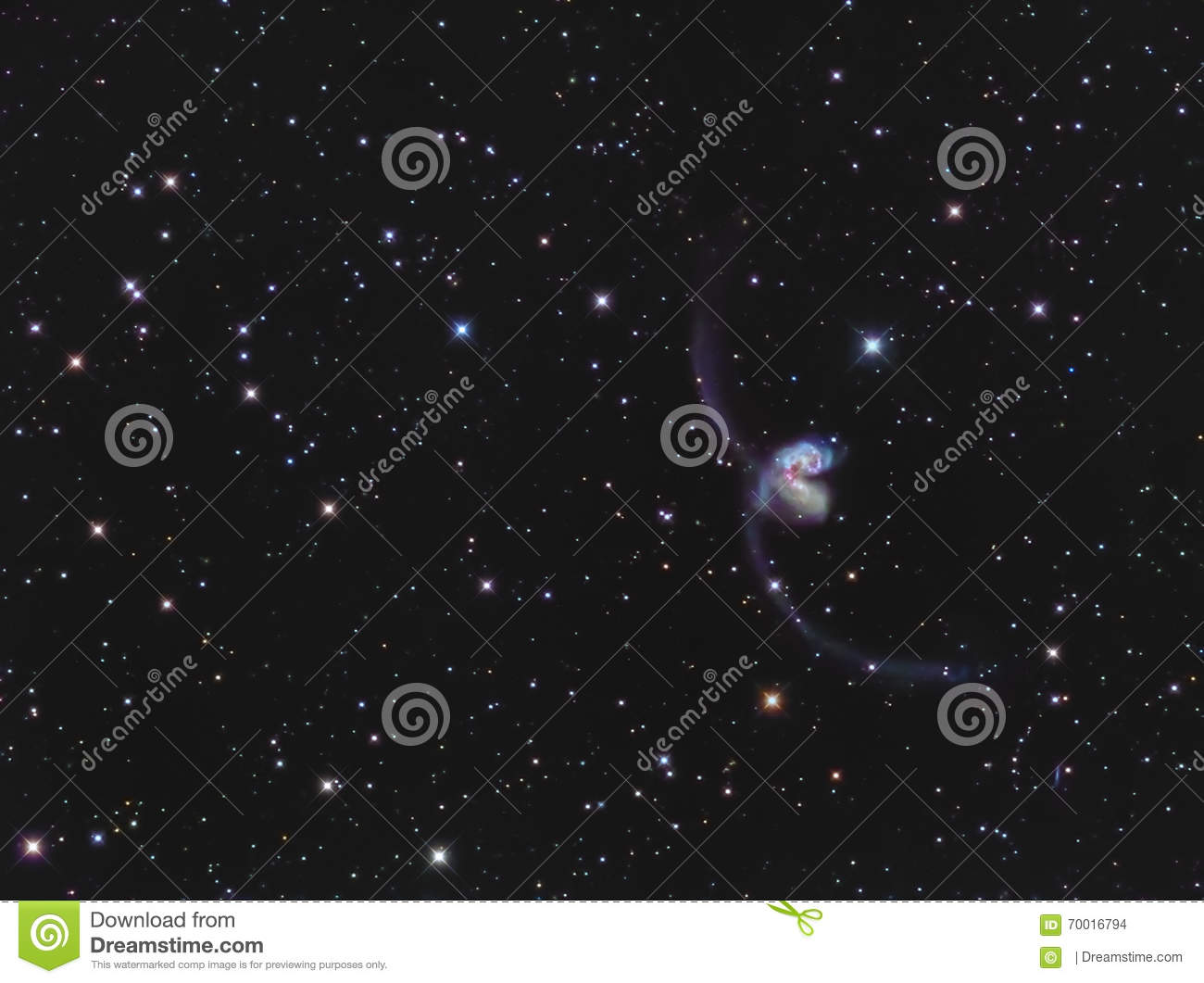 NGC 4038/4039 Antennae Galaxies In Corvus Stock Photo.