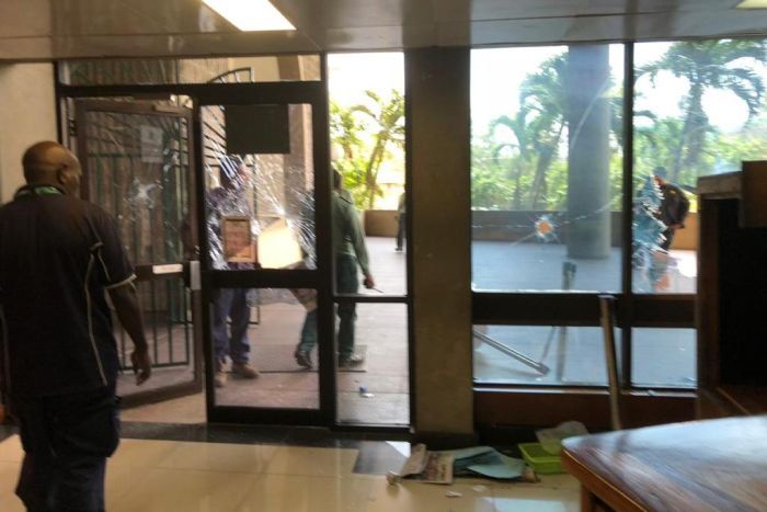 PNG Police storm Parliament over lack of APEC payments, ABC.