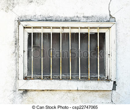 Stock Image of Run down exterior basement window.
