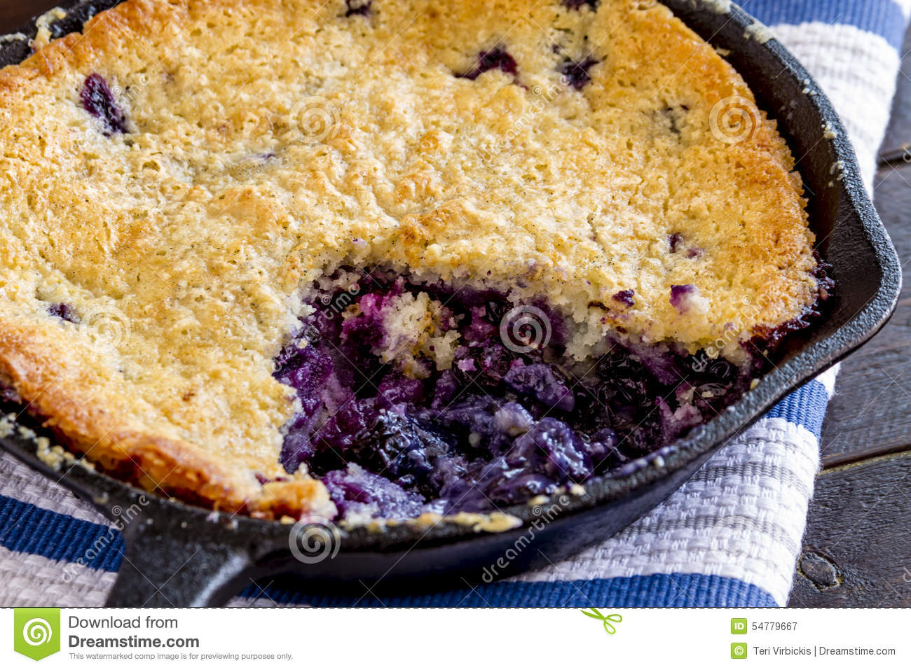 Blueberry Cobbler Baked In Cast Iron Skillet Stock Photo. Blueberry Cobbler Baked In Cast Iron Skillet Stock Photo.