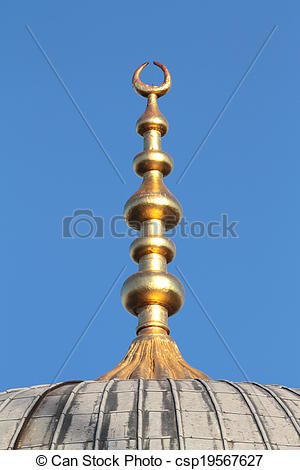 Stock Photo of Golden alem on top of the Blue Mosque domes at.