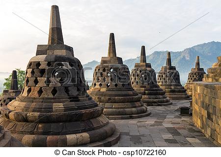 Stock Image of Borobudur temple stupa row in Indonesia.