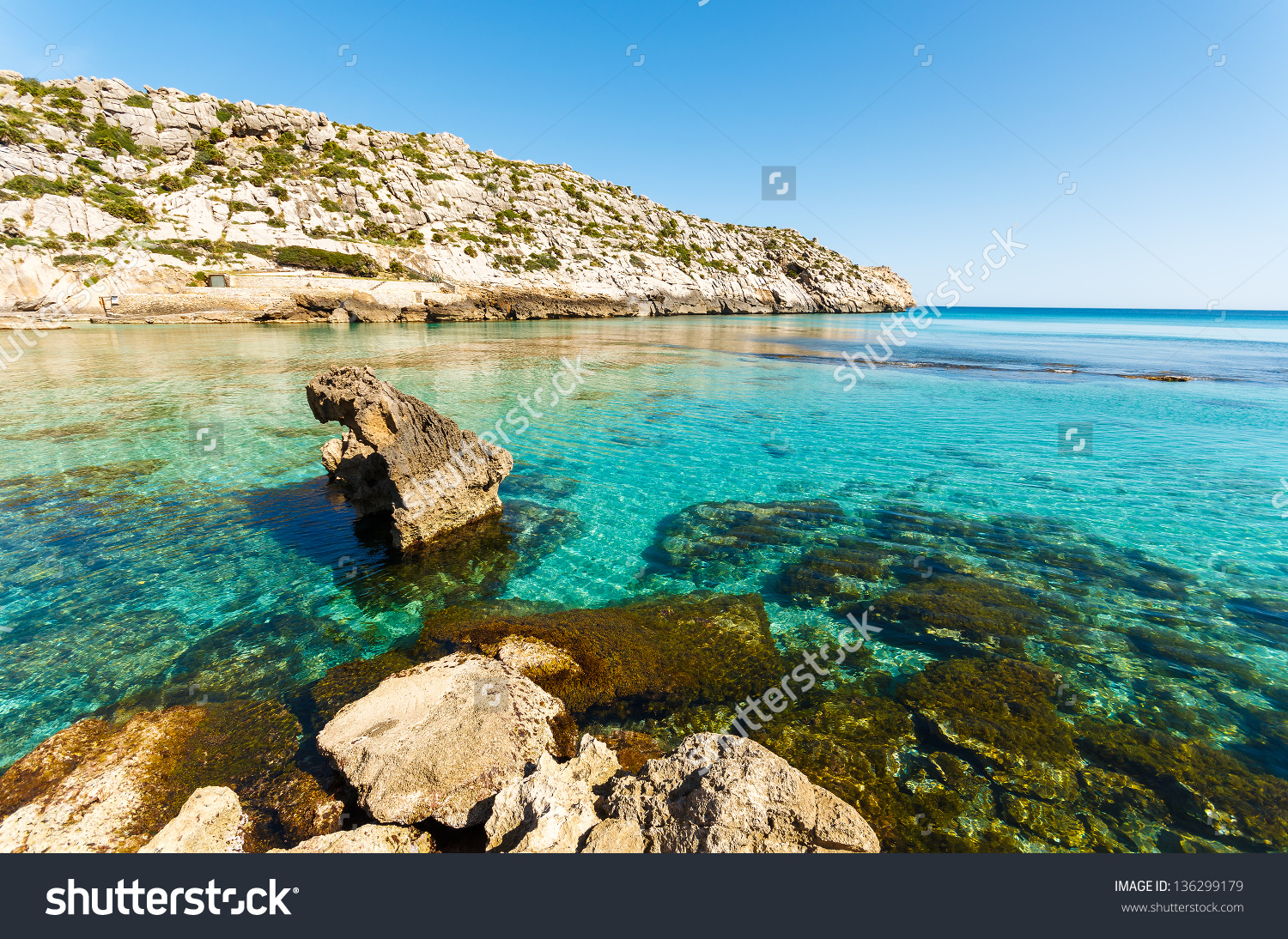 Turquoise Sea Water Of Cala San Vicente Beach, Majorca Island.