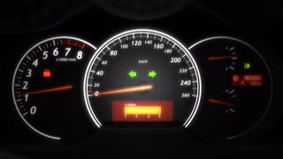 Low Gas Meter On Modern Car Dashboard Motion Background.