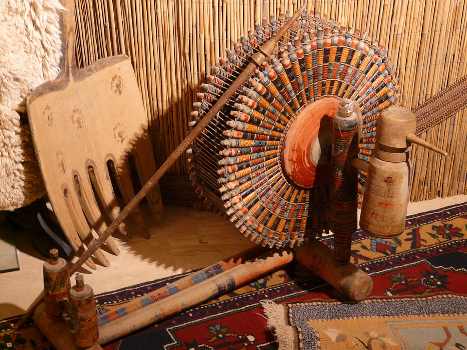 Free photo Spinning Wheel Carpet Weaving Center Spindles Turkey.