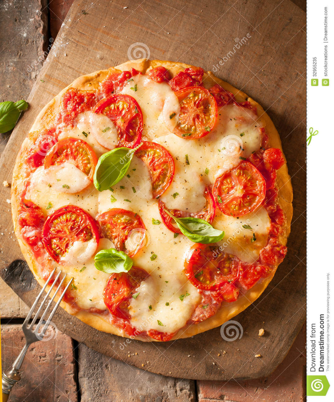 Scrumptious Fresh Cheese And Tomato Pizza Royalty Free Stock Photo.