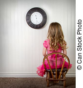 Little girl in time out or in trouble looking, with clock on.