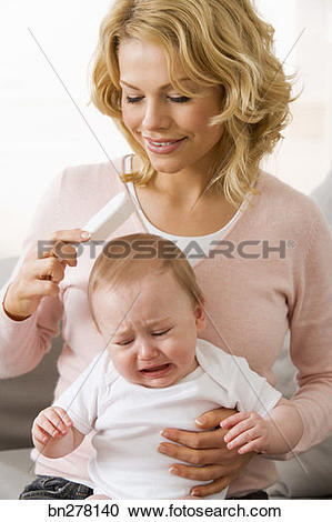 Stock Photography of Mother brushing child's hair bn278140.