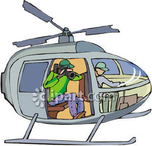 Cameraman Taking Video From Inside a Helicopter.