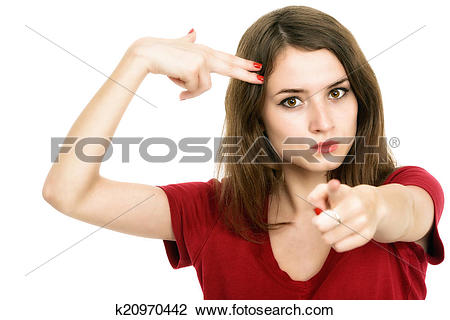 Stock Photo of Beautiful girl shooting at her head with hand gun.