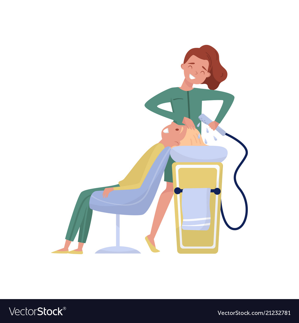 Hairdresser washing hair for her client at beauty.