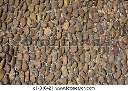 Stock Photography of Old rounded cobbles k17318421.