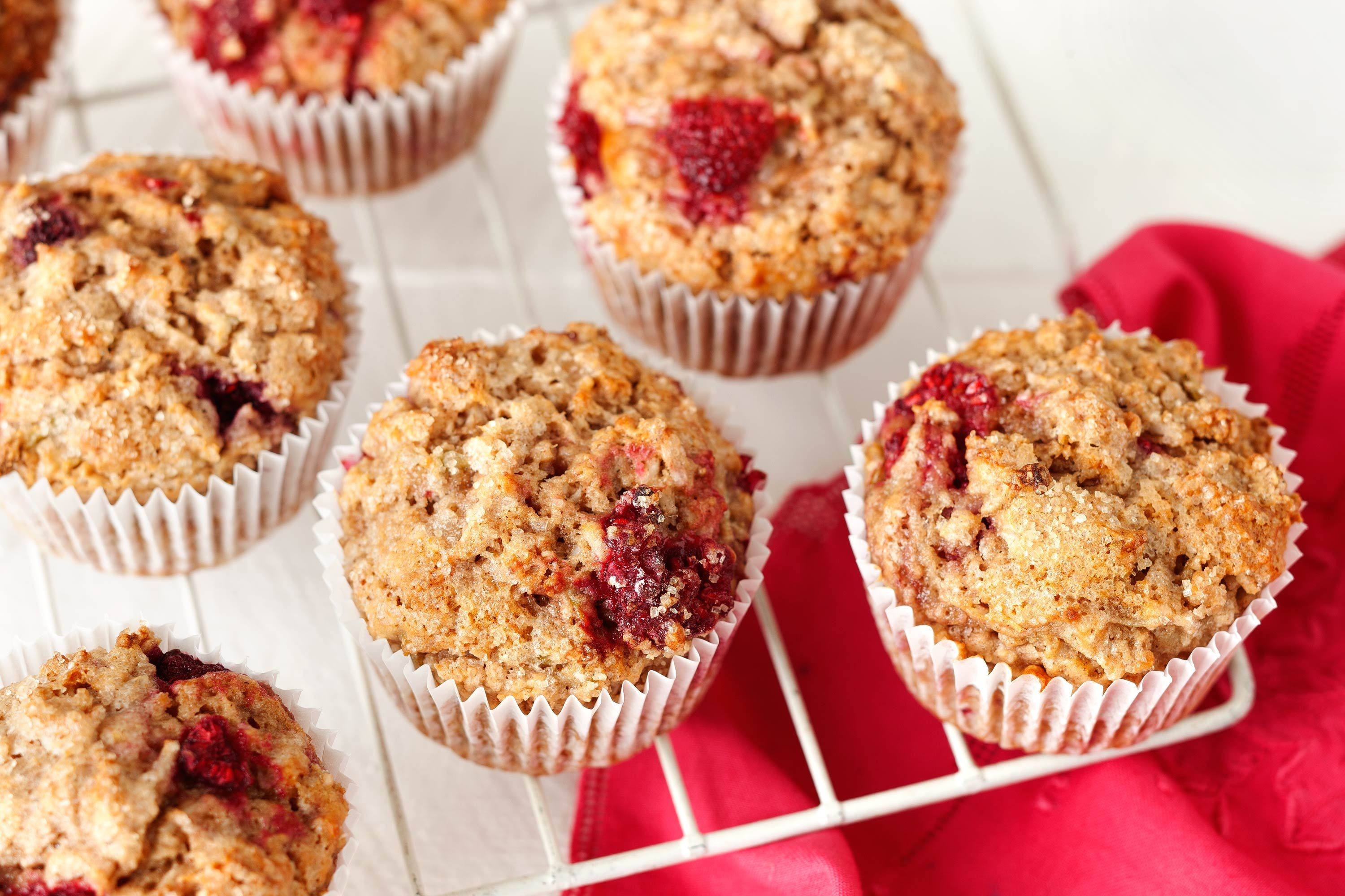 Pear, coconut and raspberry spelt muffins.