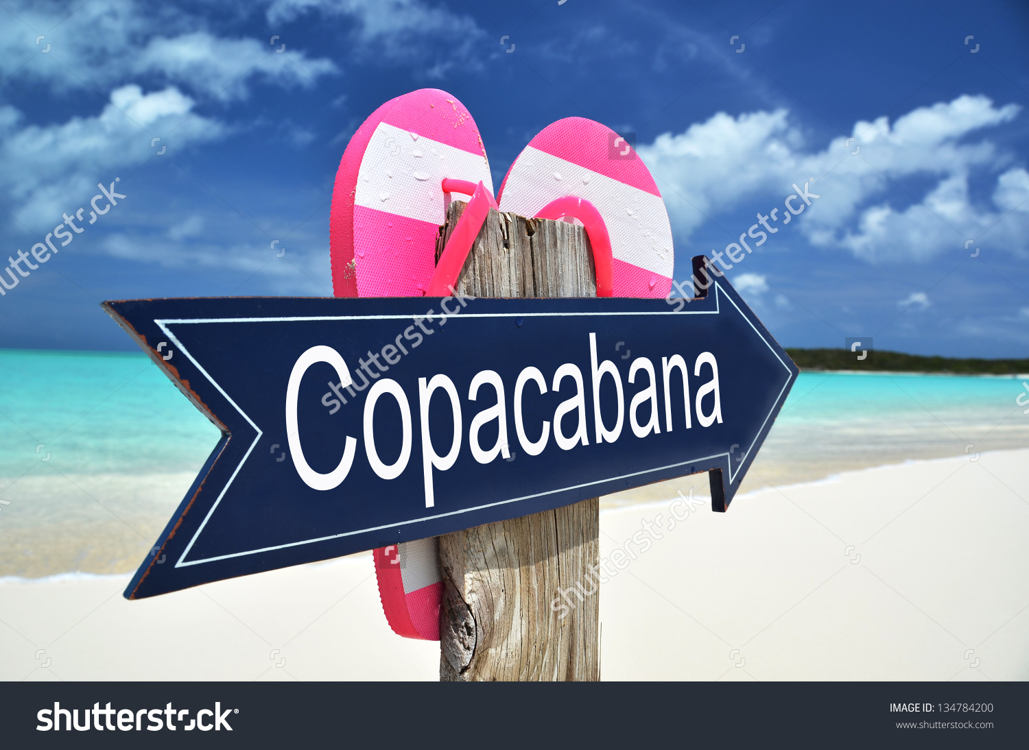 Copacabana Sign On Beach Stock Photo 134784200.