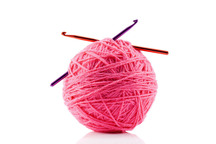 Yarn and crochet hook clipart.