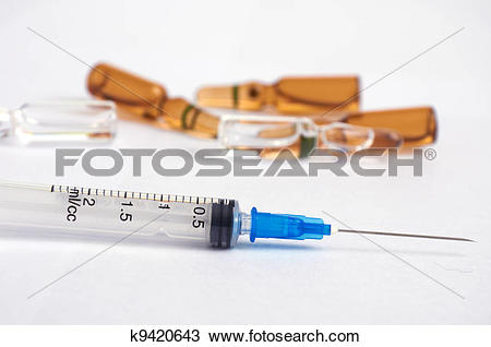 Stock Photo of Disposable syringe and ampoules k9420643.