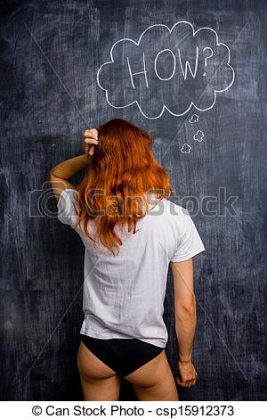 Picture of Ditzy redhead woman asking how csp15912373.