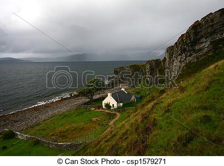 Stock Photography of Isolated house and scottish landscape at port.