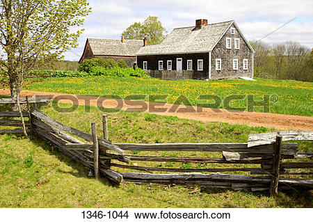 Stock Photo of Houses in a field, Ross Farm Museum, New Ross, Nova.
