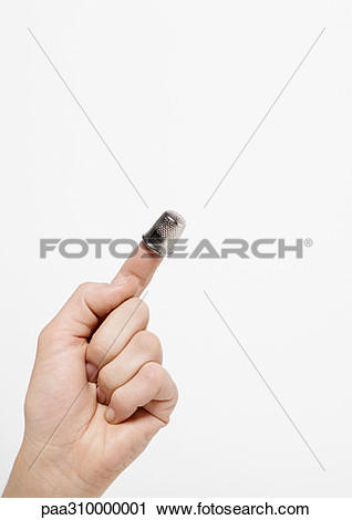 Stock Photography of Hand with thimble on forefinger paa310000001.