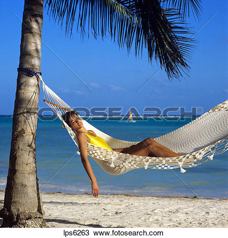 Stock Photo of MR YOUNG WOMAN IN YELLOW SWIMSUIT SLEEPING IN.