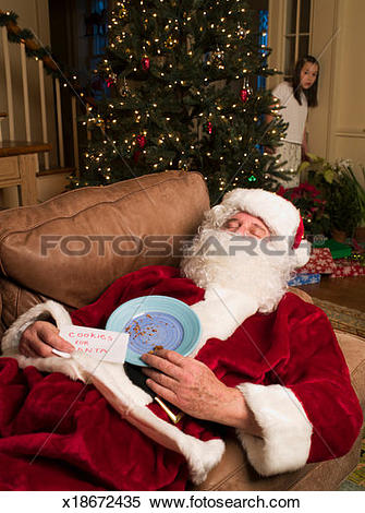 Stock Image of Santa Claus asleep on coach, girl (8.