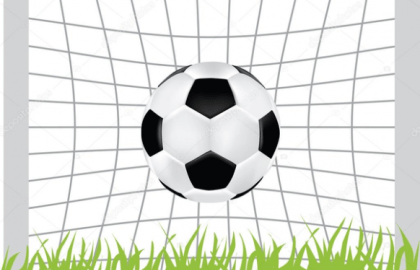 Soccer Football in Goal Net.