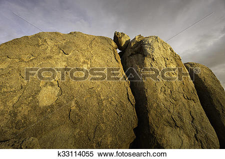 Stock Image of Dramatic desert rock formation k33114055.