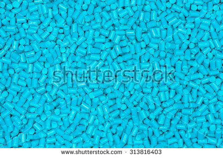 Light Blue Color Plastic Granulate In Glancing Light For.