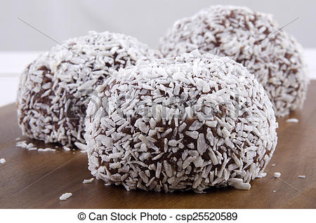 Pictures of rum balls with grated coconut.