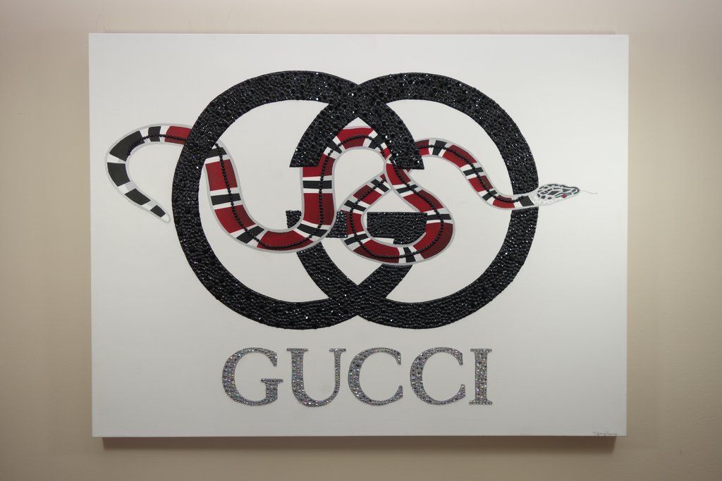 Gucci Snakes Logo.