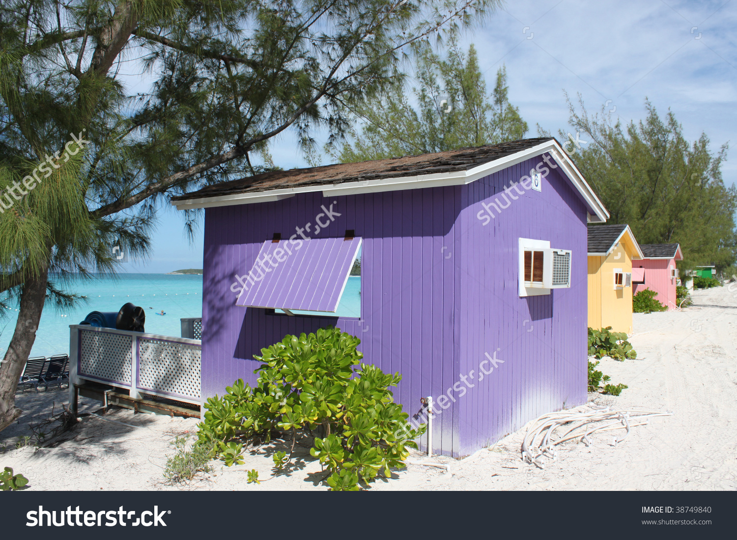 Colorful Tropical Cabanas Or Shelters On The Beach Of Half Moon.