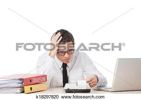 Stock Photography of stressed young worker holding head. upset.