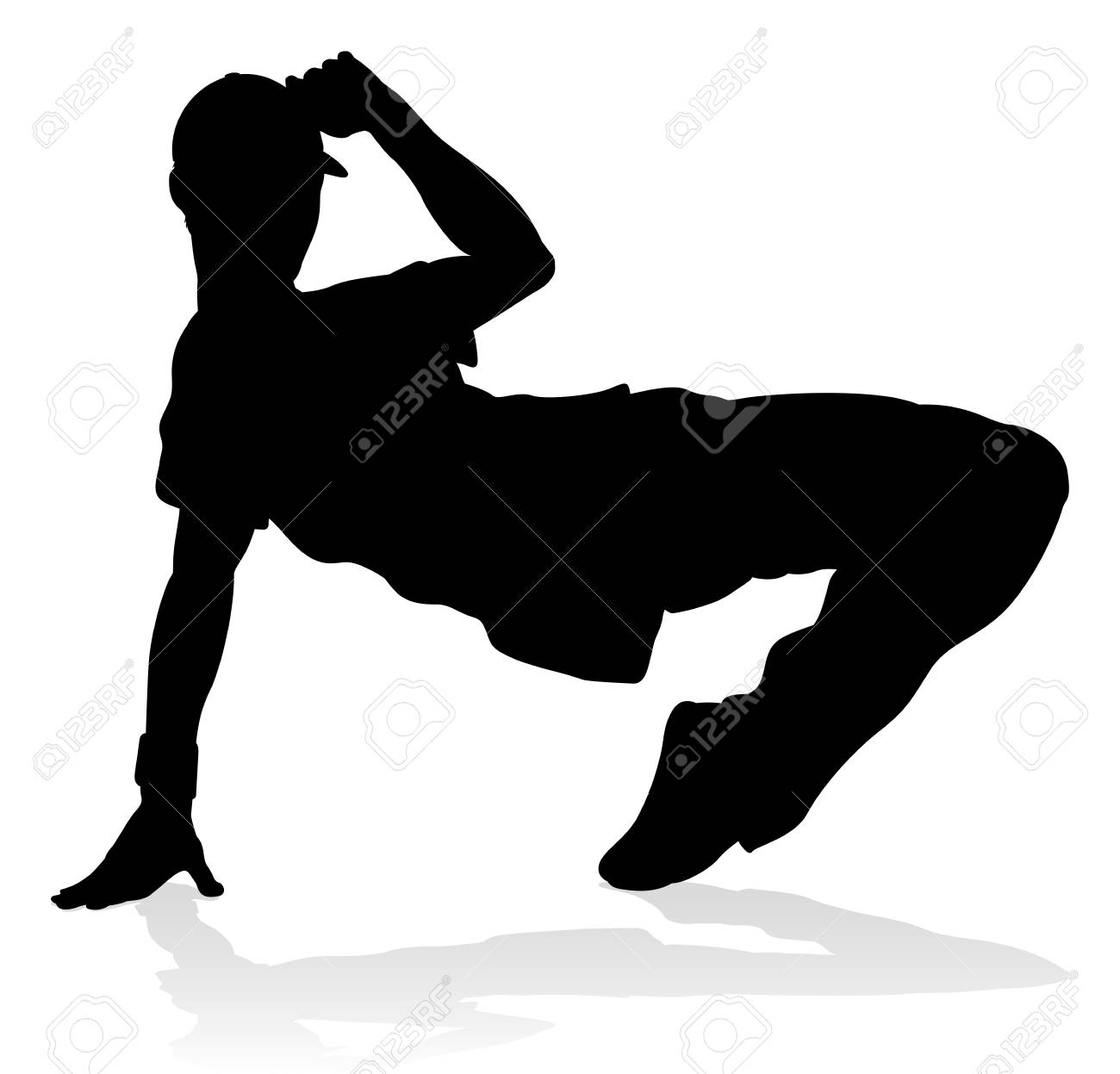 A male street dance hip hop dancer in silhouette.