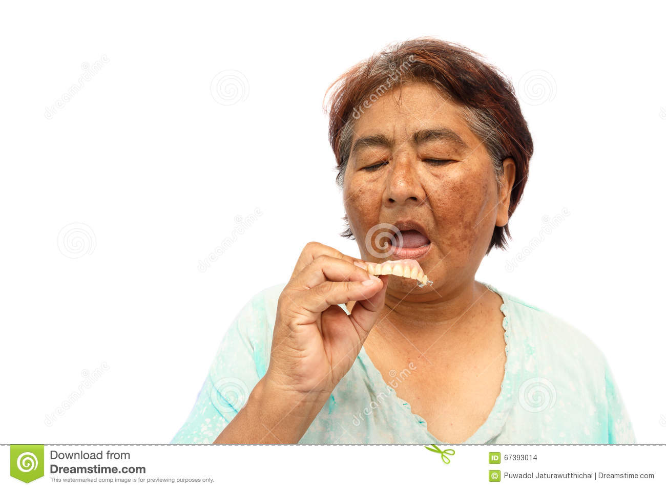 Putting dentures in mouth clipart.