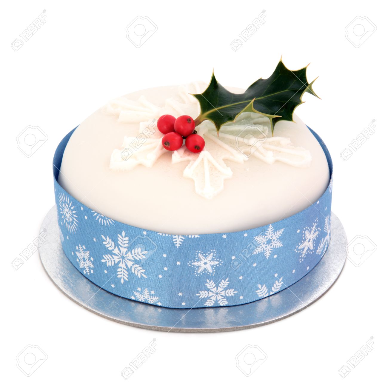 Christmas Cake With Icing Sugar Snowflake Deisgn And Holly With.