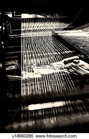 Stock Image of Close up view of Jacquard loom with pattern formed.