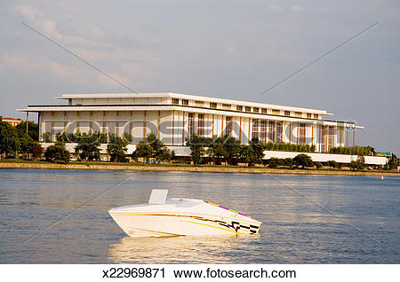 Stock Photography of A boat in front of a government building.