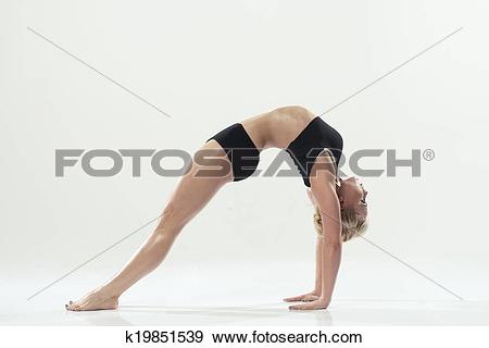 Stock Photograph of Fitness woman in the bridge position k19851539.