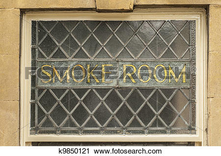 Stock Photography of Old gold smoke room sign in an old leaded.