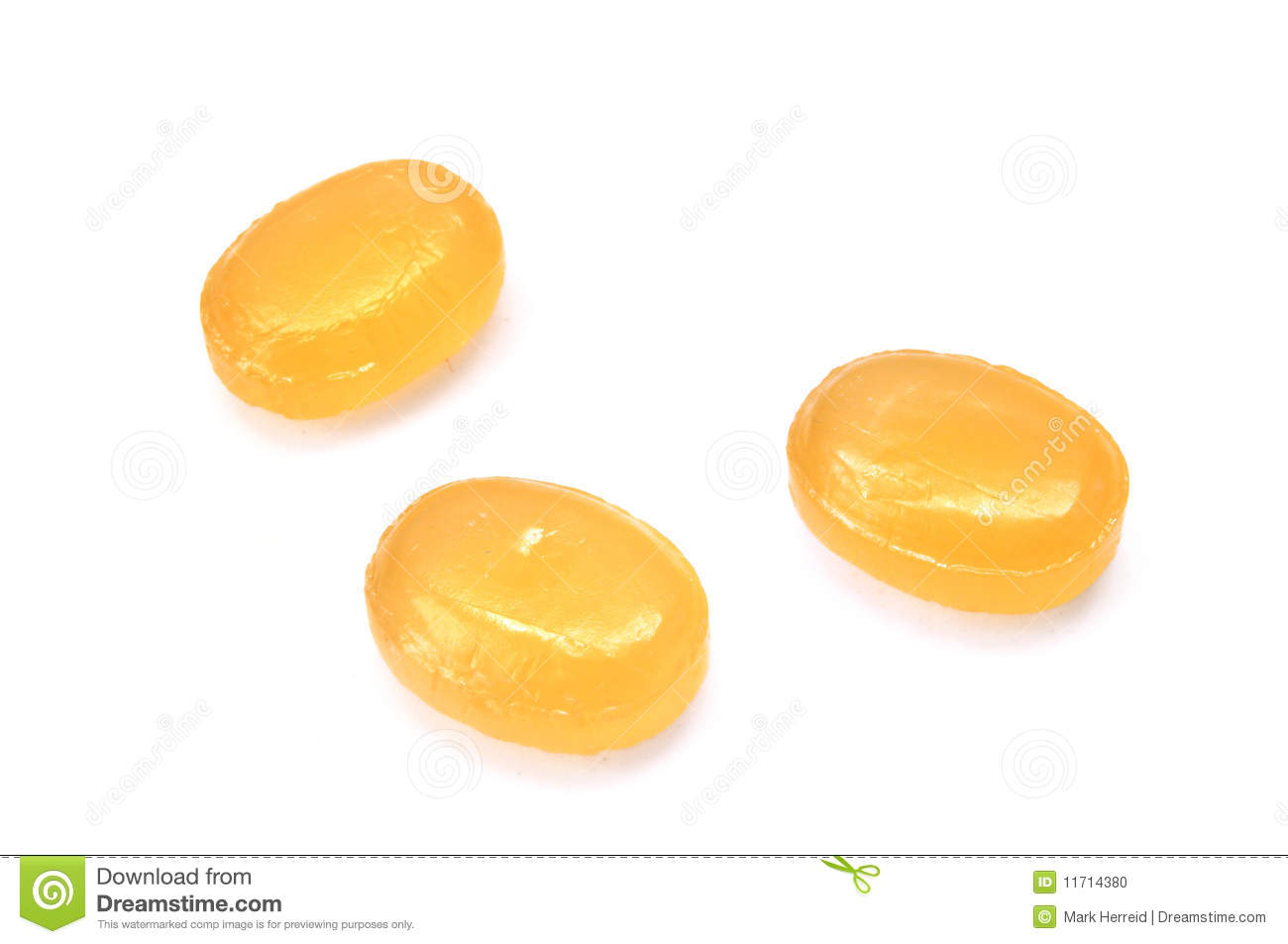 Three Yellow Cough Drops (Throat Lozenges) Stock Photo.