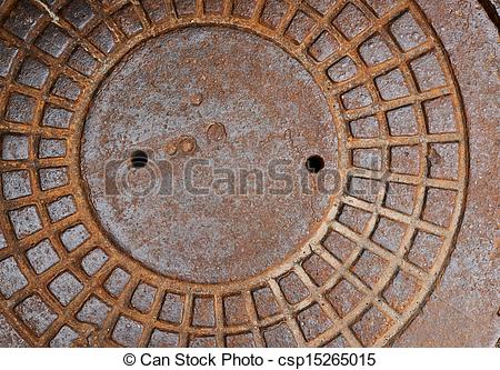 Stock Photography of Metal sewer manhole cover fragment as a.