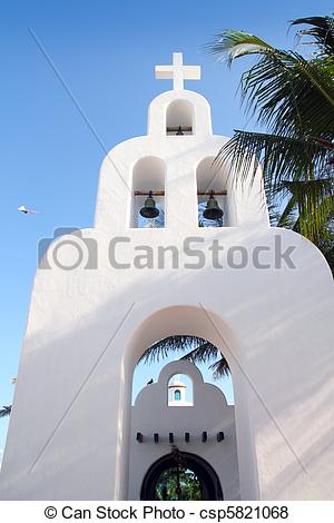 Pictures of Playa del Carmen white Mexican church archs belfry.