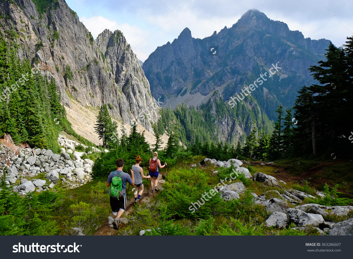 Three Hikers On Mountain Trail Cascade Stock Photo 363286607.