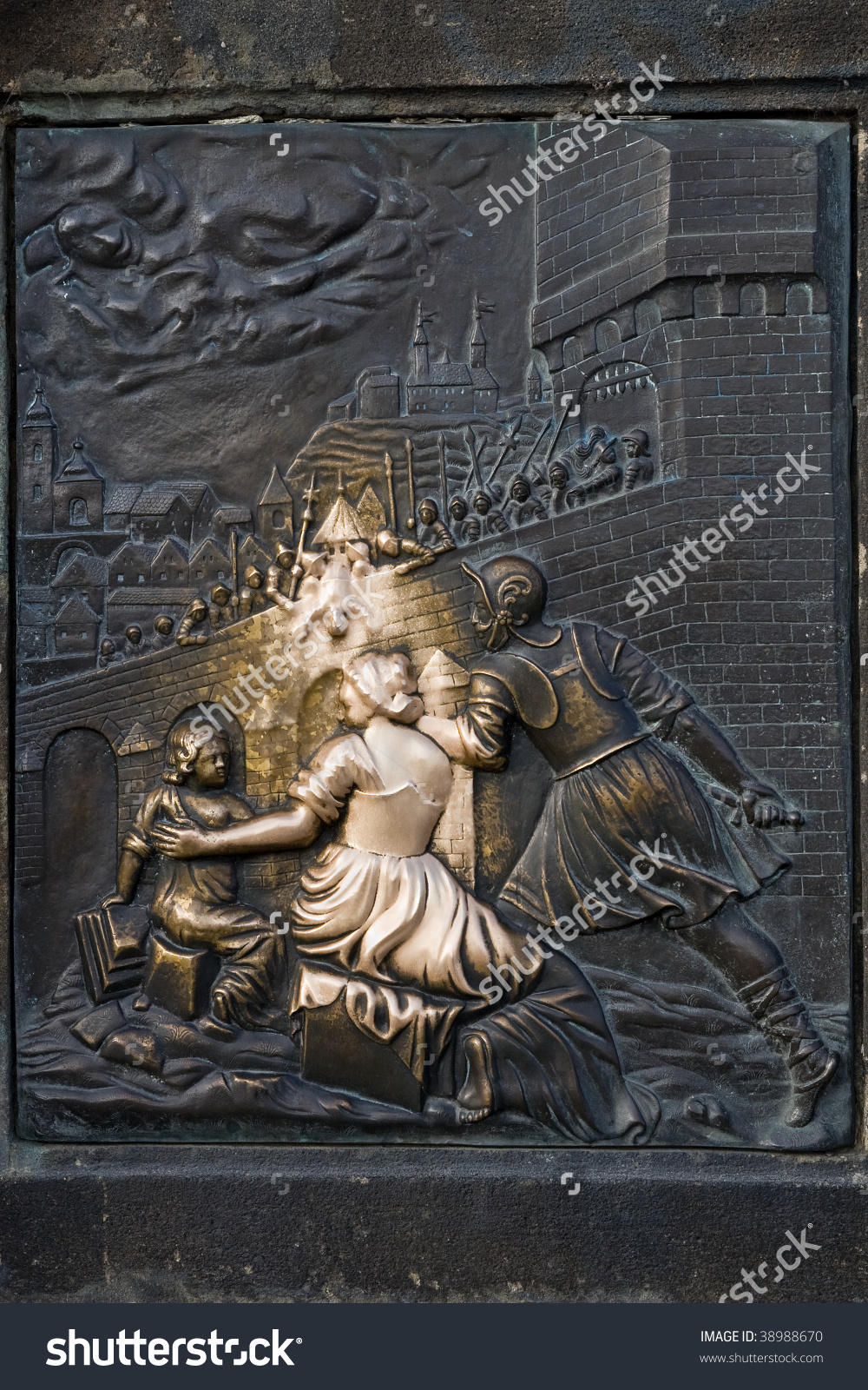 An Old Relief Below The Statue Of St. John Of Nepomuk On Charles.